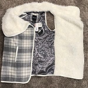 NWT faux fur vest.
